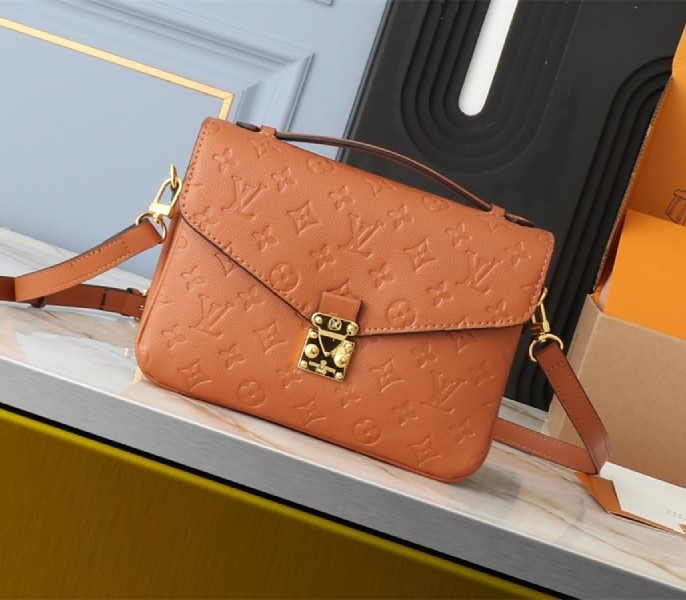 L0vis Vvtt0n Monogram Empreinte Metis Handbag In Cognac Brown