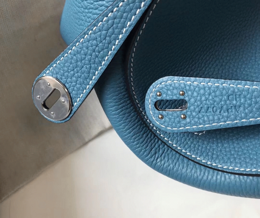 Replica H**me5 Lindy 26cm bag in blue jean fabric