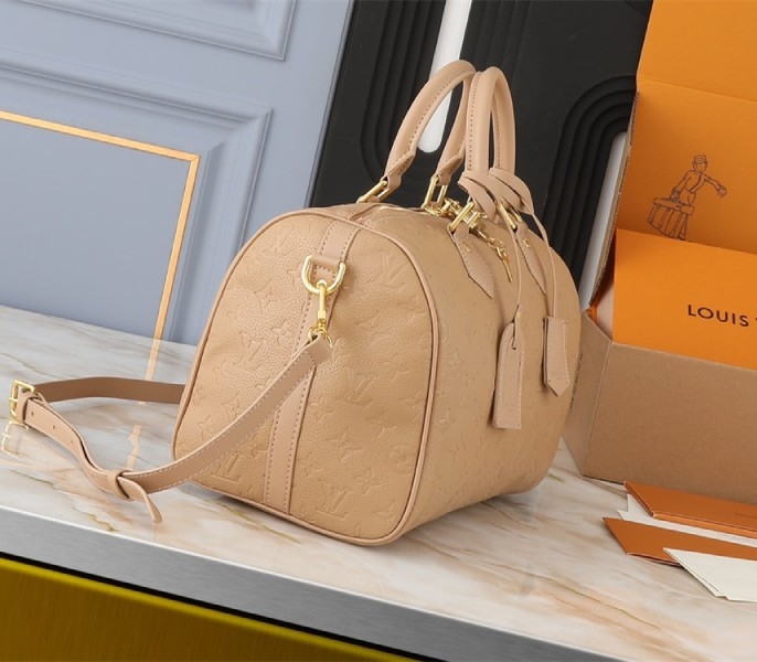 L0vis Vvtt0n Monogram Empreinte Speedy Soft 30 Handbag In Apricot