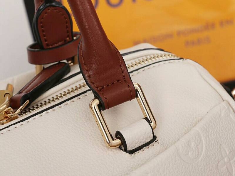 L0vis Vvtt0n Monogram Empreinte Speedy Bandouliere 25 Handbag In Cream