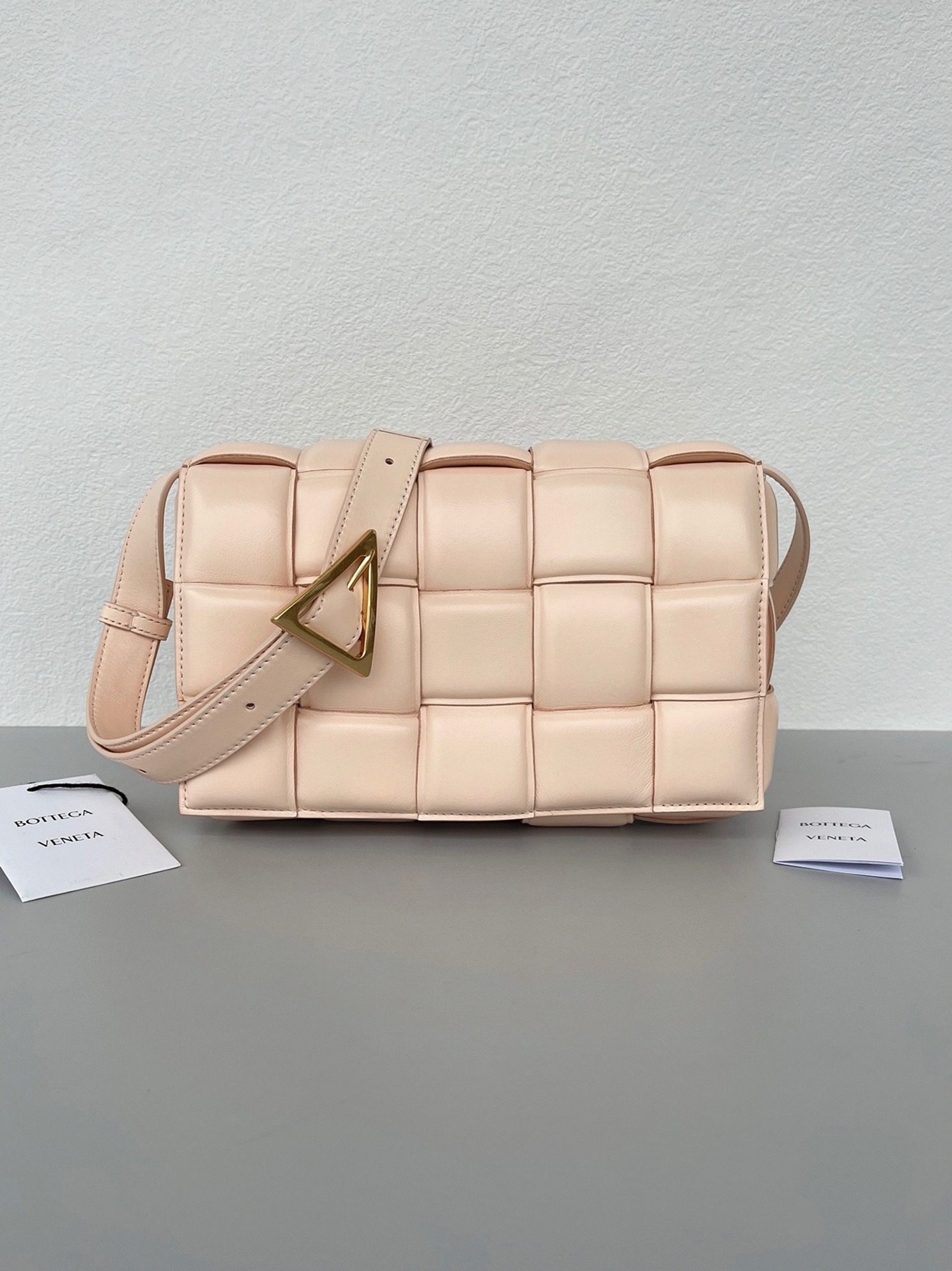 Top Quality Fake B0tt*ga Ven*ta Padded Cassette Bag In Melon