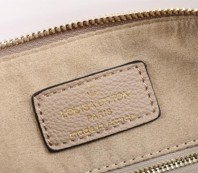 L0vis Vvtt0n Bicolor Monogram Empreinte Leather Speedy Bandouliere 25 Handbag In Tourterelle Gray And Cream