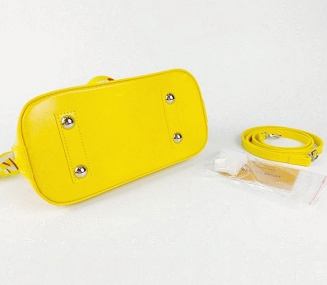 L0vis Vvtt0n Epi Leather Alma BB Handbag In Cedrat Yellow With Jacquard Strap