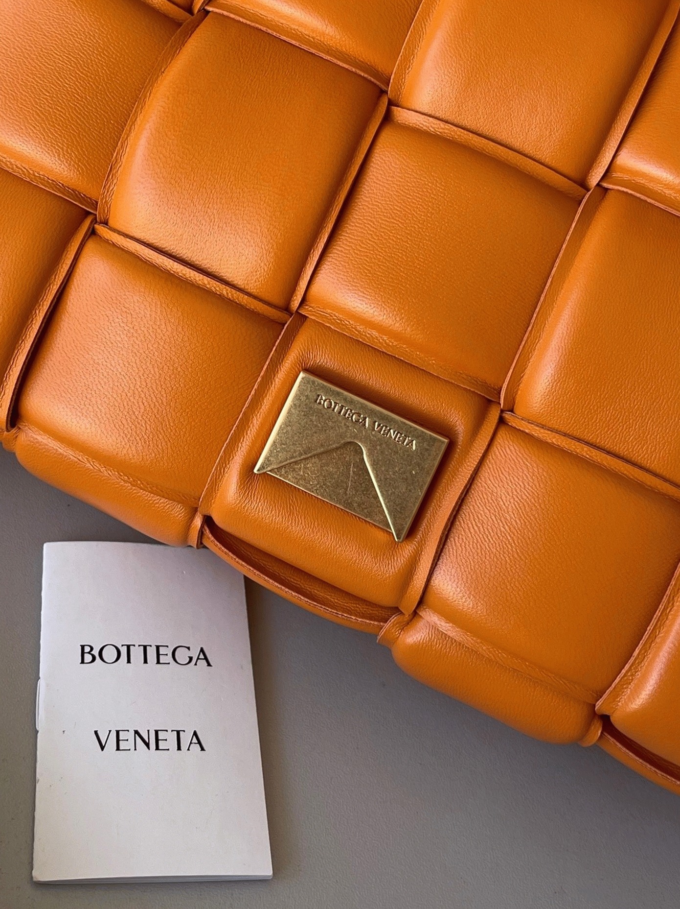 Top Quality Faux B0tt*ga Ven*ta Padded Cassette Bag In Orange