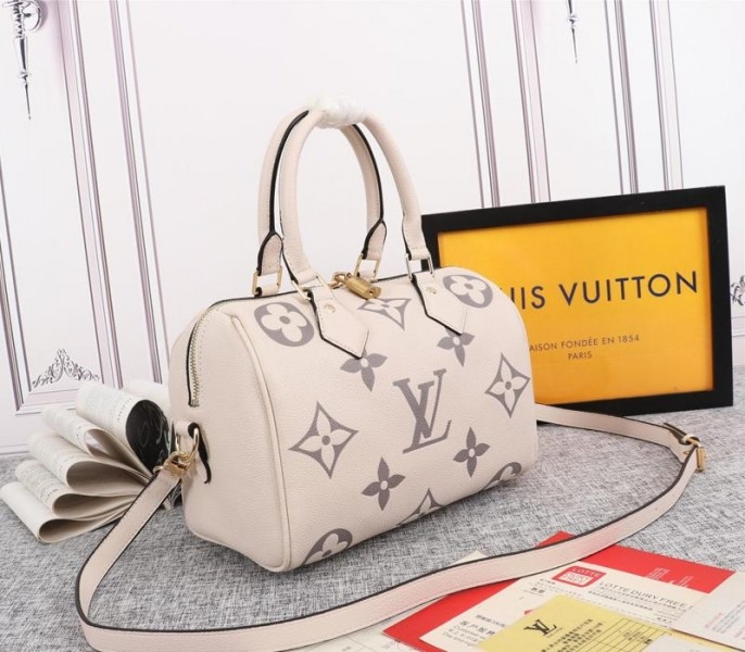 L0vis Vvtt0n Bicolor Monogram Empreinte Leather Speedy Bandouliere 25 Handbag In Cream And Bois De Rose Pink
