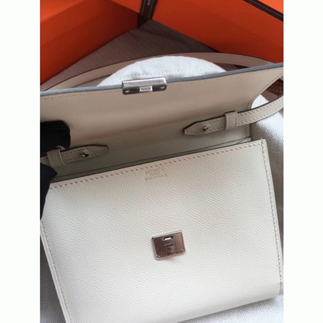 White top knockoff H**me5 Clic wallet with strap