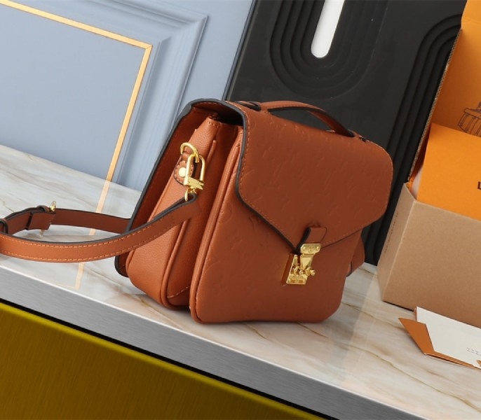 L0vis Vvtt0n Monogram Empreinte Metis Handbag In Cognac Brown