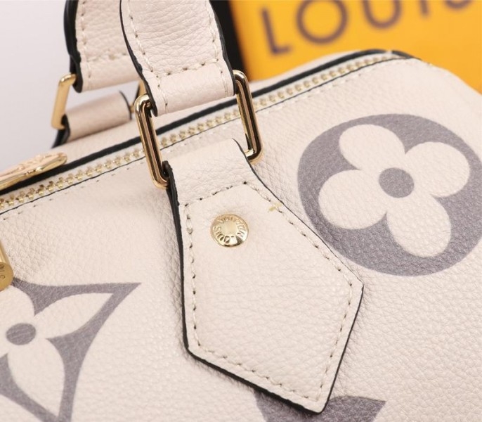 L0vis Vvtt0n Bicolor Monogram Empreinte Leather Speedy Bandouliere 25 Handbag In Cream And Bois De Rose Pink
