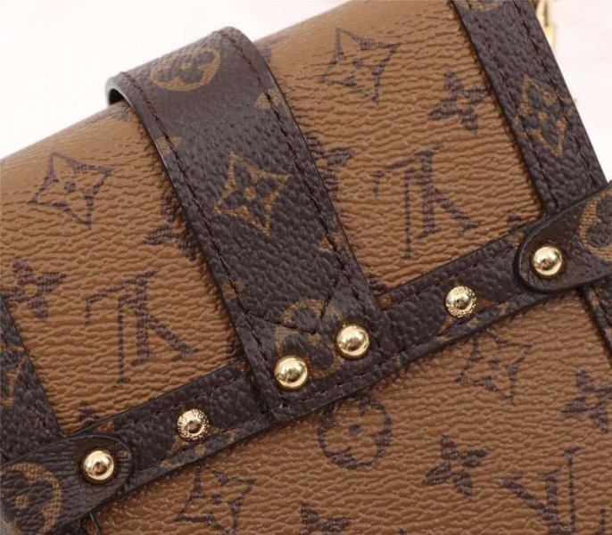 L0vis Vvtt0n Monogram Reverse Canvas Vertical Trunk Pochette