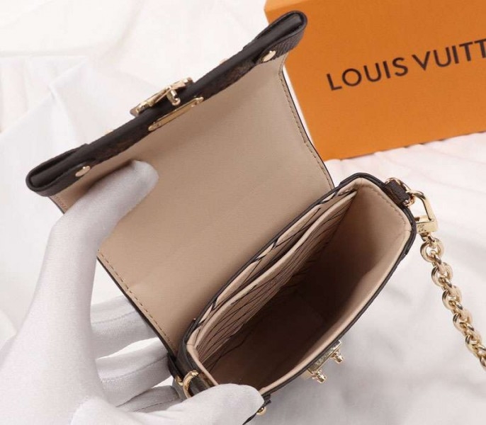 L0vis Vvtt0n Monogram Reverse Canvas Vertical Trunk Pochette