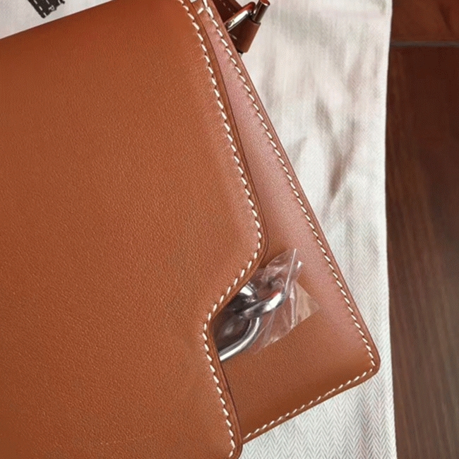 Caramel replica H**me5 Mini Sac Roulis handbag