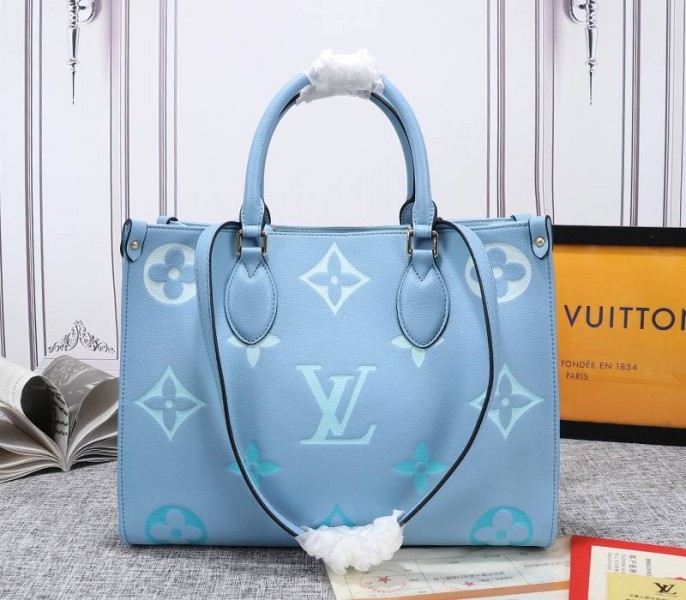 L0vis Vvtt0n Monogram Empreinte Leather Onthego MM Bag In Summer Blue
