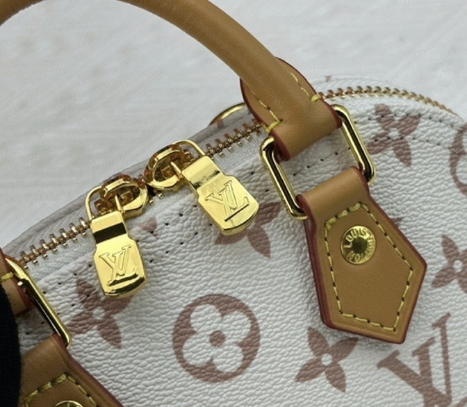 L0vis Vvtt0n Monogram Dune Canvas Nano Alma Bag