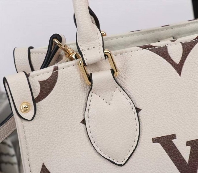 L0vis Vvtt0n Bicolor Monogram Empreinte Leather Onthego PM Bag In Cream And Bois De Rose Pink