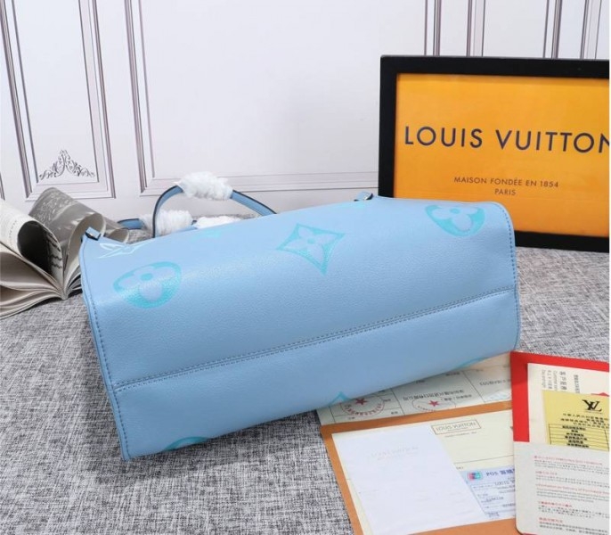 L0vis Vvtt0n Monogram Empreinte Leather Onthego MM Bag In Summer Blue