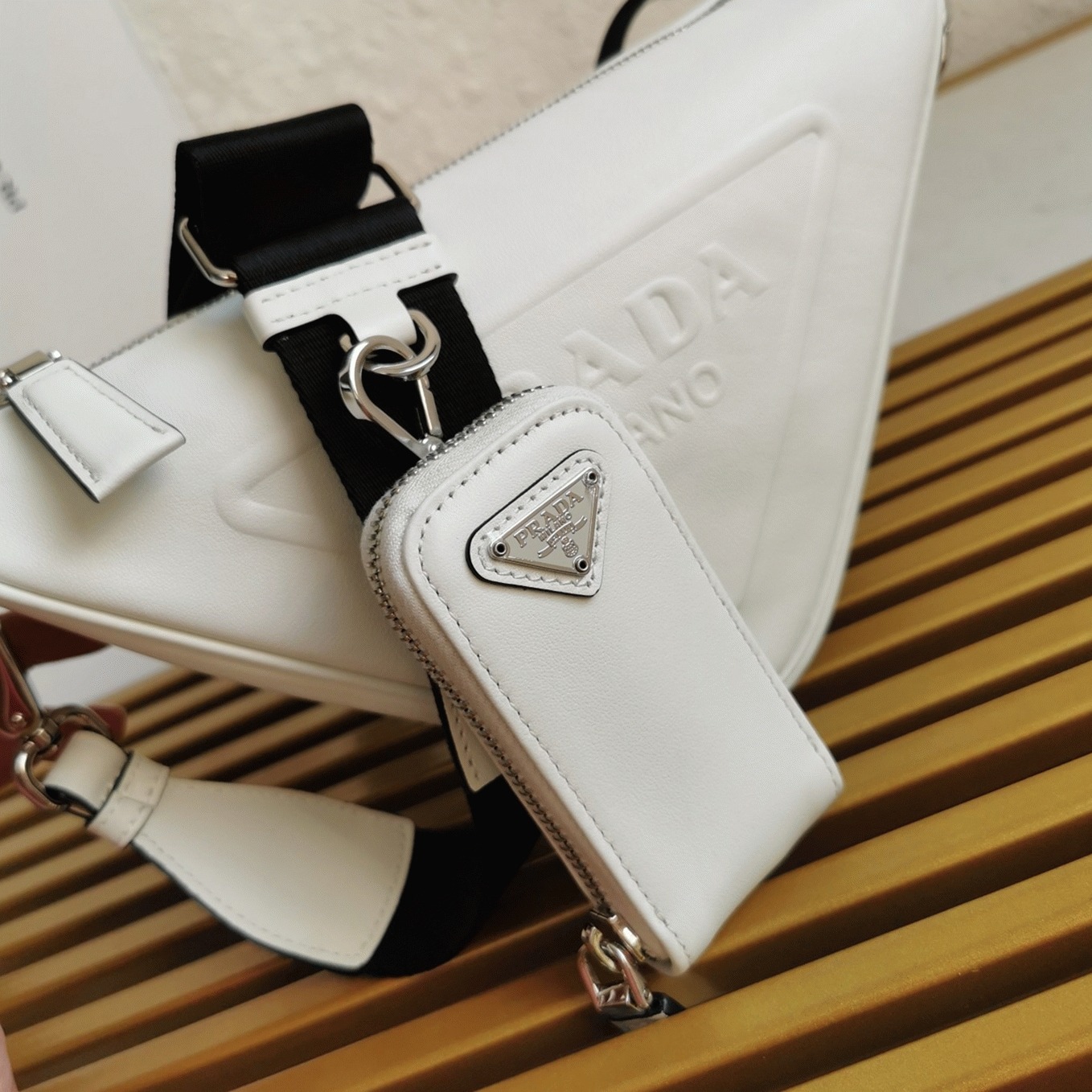 Pra*a Triangle Shoulder Bag Fake in White