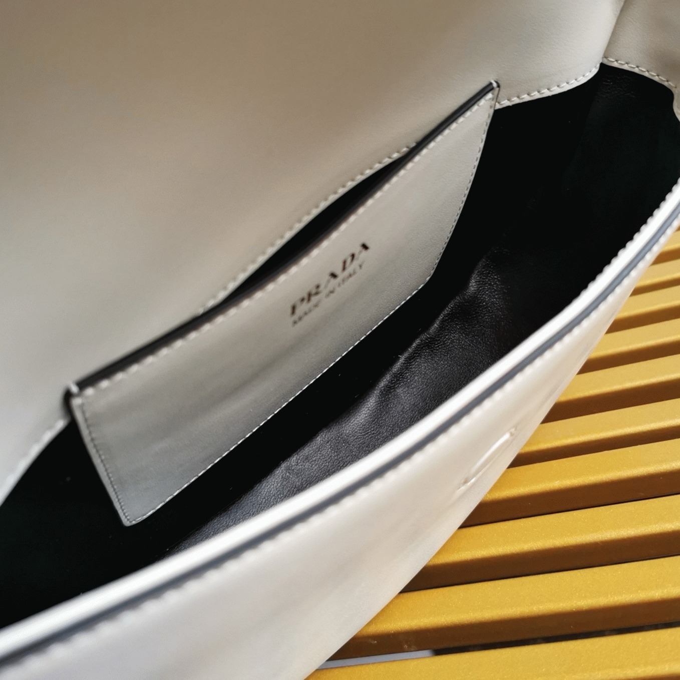 Pra*a Arque Shoulder Bag with Flap Knockoff in White