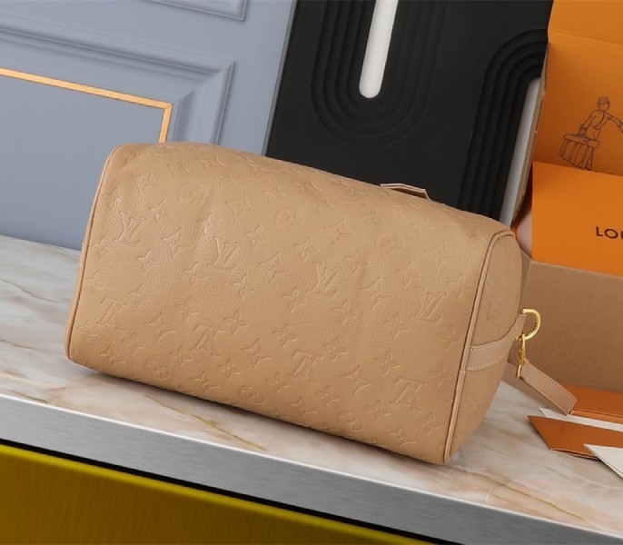 L0vis Vvtt0n Monogram Empreinte Speedy Soft 30 Handbag In Apricot