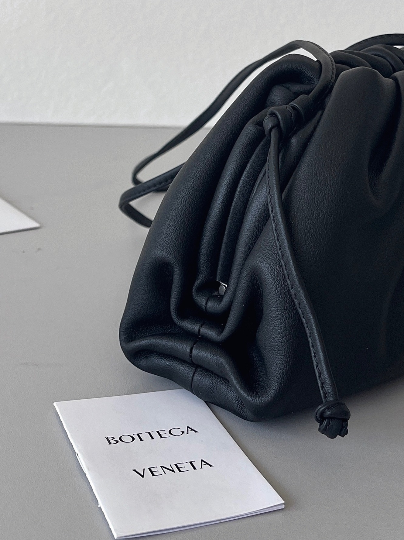 Knockoff B0tt*ga Ven*ta Mini Pouch with Strap Black