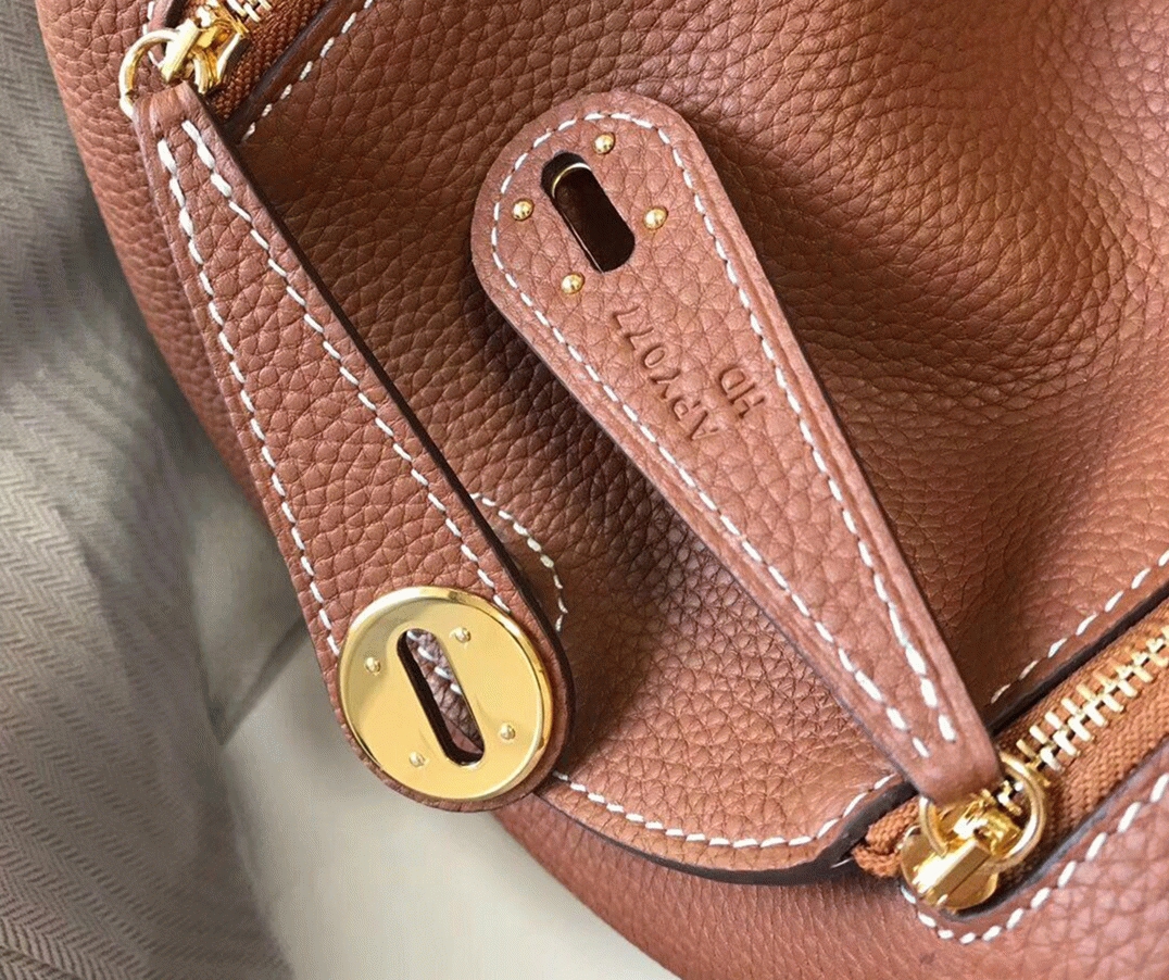 Top replica H**me5 Lindy Mini handbag in gold