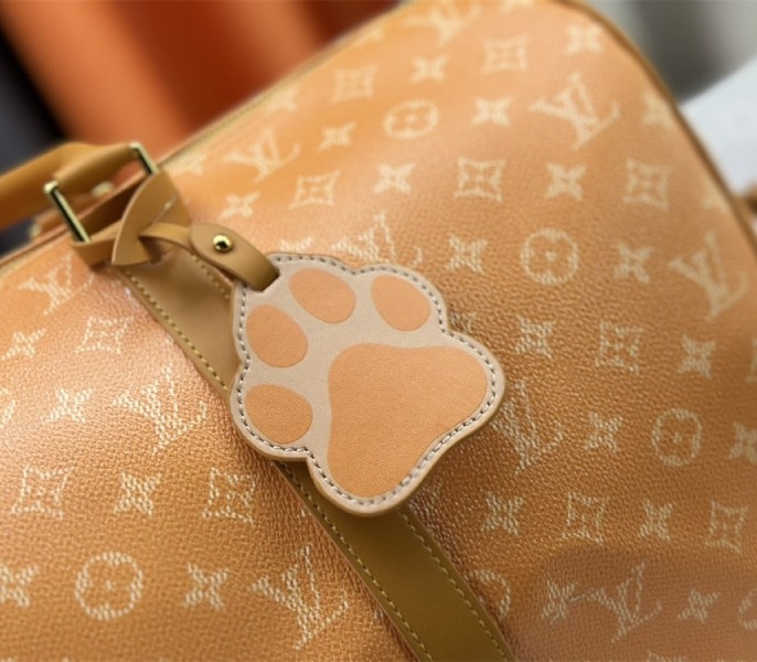L0vis Vvtt0n Monogram Heritage Canvas Keepall Bandouliere 45 In Yellow