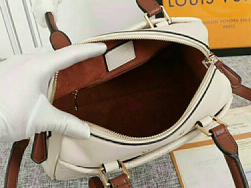 L0vis Vvtt0n Monogram Empreinte Speedy Bandouliere 25 Handbag In Cream