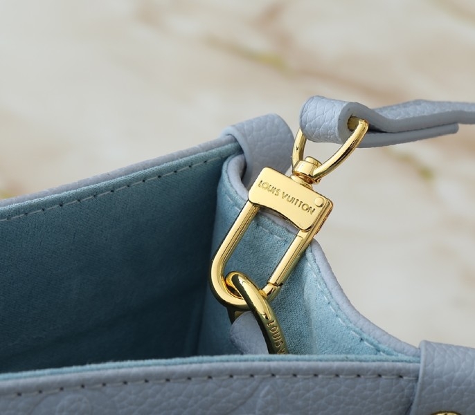 LV X TM Monogram Empreinte OnTheGo PM With Bijou Edition In Washed Blue