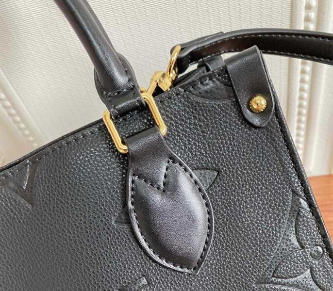 L0vis Vvtt0n Monogram Empreinte Leather Onthego PM Bag In Black