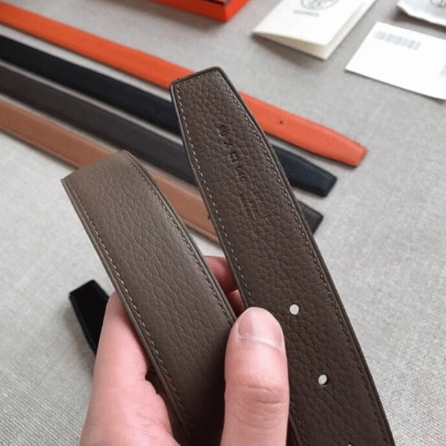 Knockoff H**me5 Etrier buckle belt in taupe shade