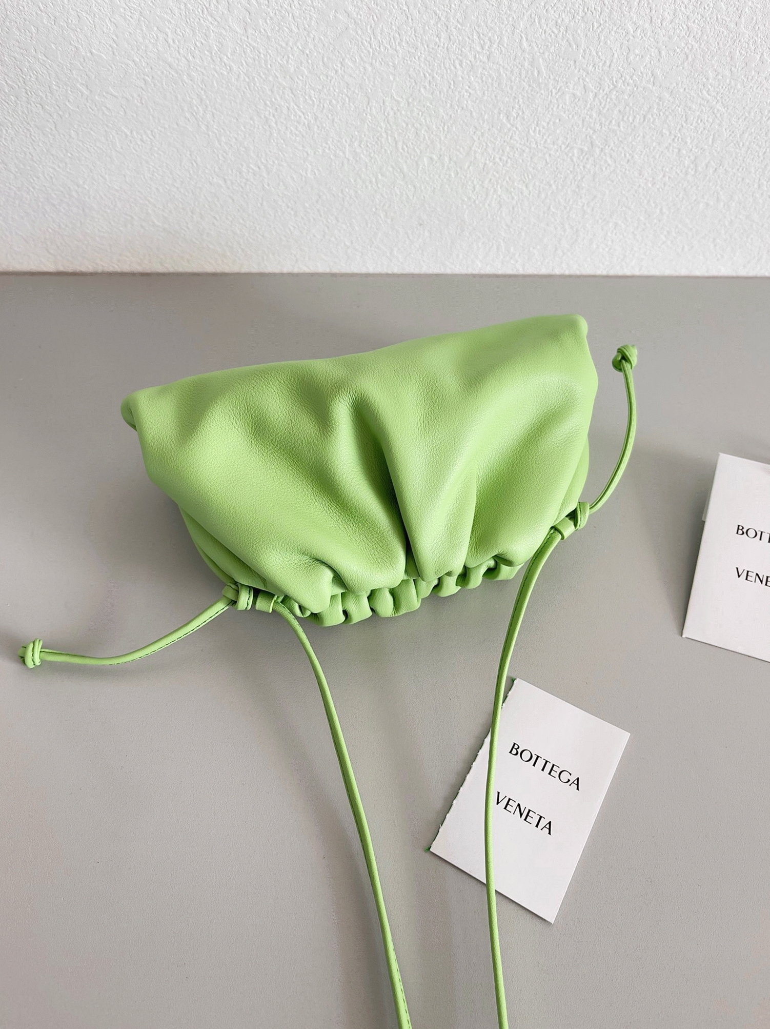 Fake B0tt*ga Ven*ta Mini Pouch with Strap Pistachio