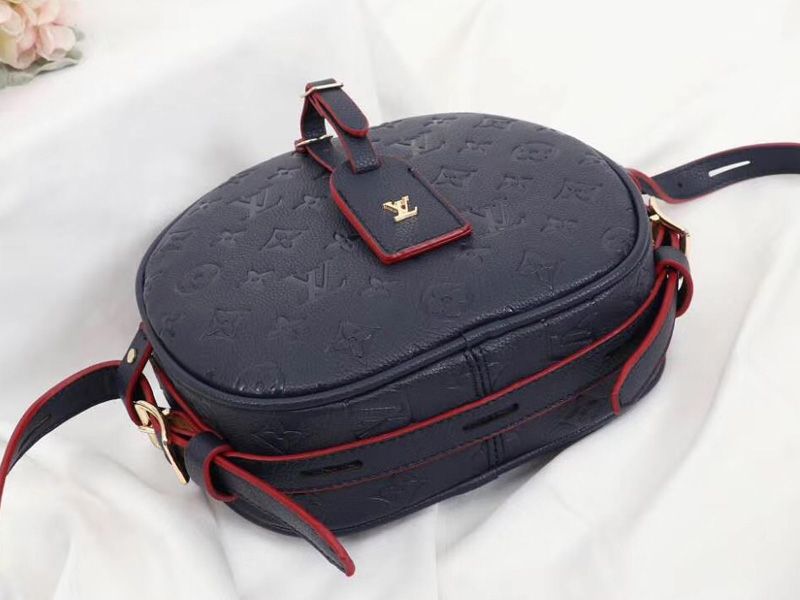 L0vis Vvtt0n Monogram Empreinte Boite Chapeau Souple MM Bag In Navy Blue
