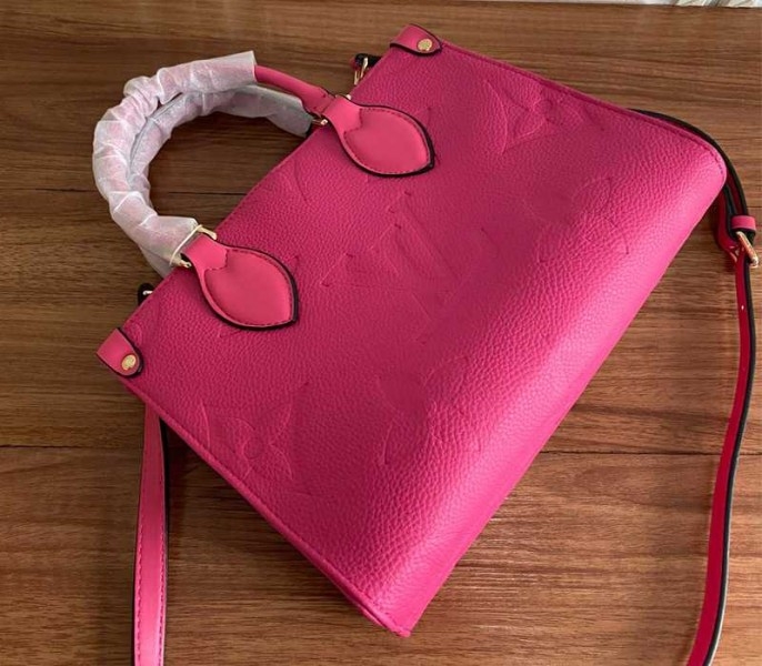 L0vis Vvtt0n Monogram Empreinte Leather Onthego PM Bag In Freesia Pink
