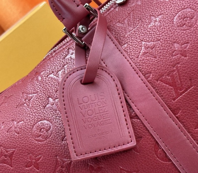 L0vis Vvtt0n Taurillon Leather Keepall Bandouliere 50 In Sari Red