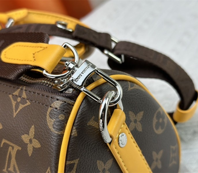 L0vis Vvtt0n Monogram Macassar Canvas Keepall Bandouliere 25 In Safran Yellow