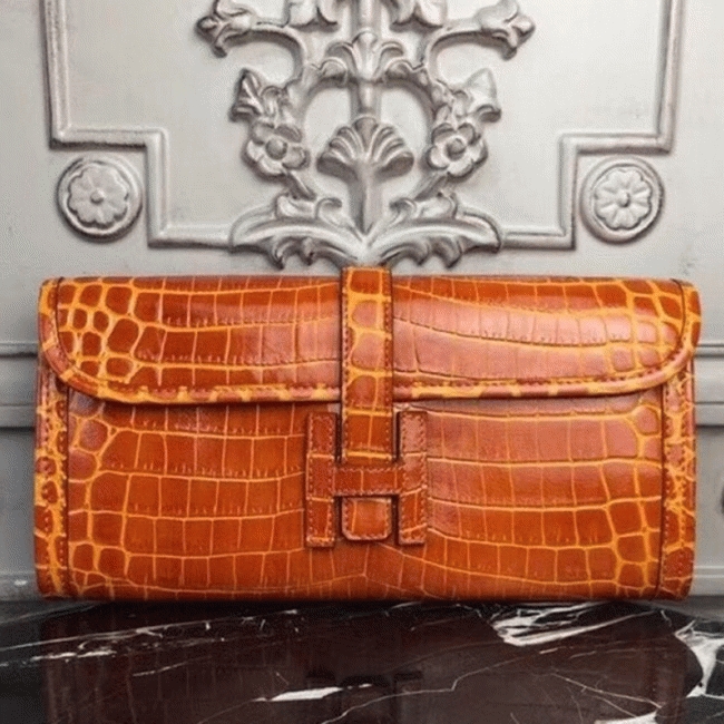 Orange crocodile leather knockoff H**me5 Jige Elan clutch bag