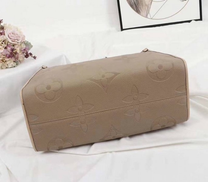L0vis Vvtt0n Monogram Empreinte Giant Onthego GM Tote In Beige