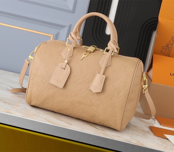 L0vis Vvtt0n Monogram Empreinte Speedy Soft 30 Handbag In Apricot