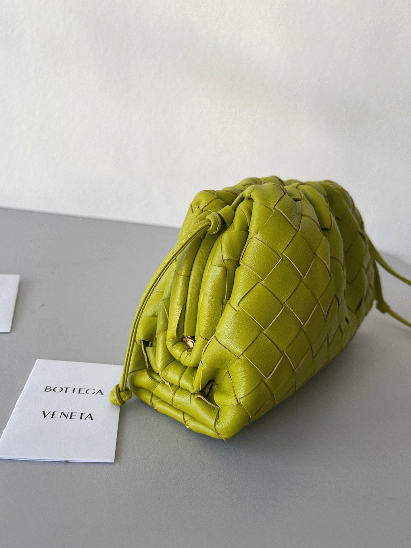 Fake B0tt*ga Ven*ta Mini Pouch with Strap Kiwi