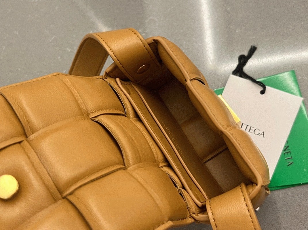 Top Quality Fake B0tt*ga Ven*ta Candy Padded Cassette Bag In Camel