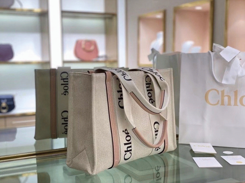top quality replica Ch10e medium woody tote bag in canvas with beige leather strips