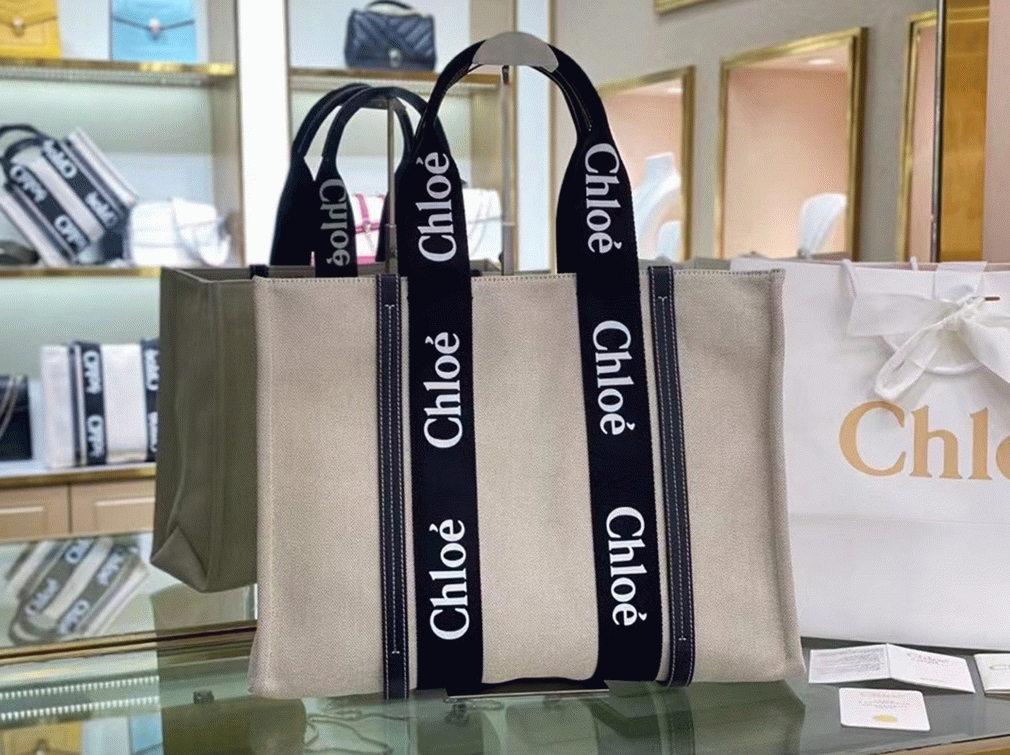 top quality knockoff Ch10e medium woody tote bag in canvas with black leather strips