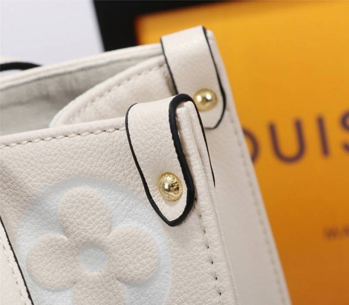 L0vis Vvtt0n Monogram Empreinte Leather Onthego MM Bag In Cream Saffron