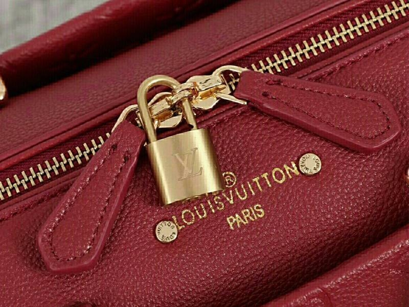 L0vis Vvtt0n Monogram Empreinte Speedy Bandouliere 25 Handbag In Bordeaux