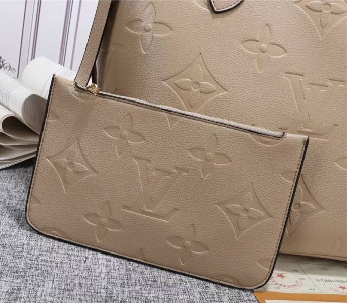 L0vis Vvtt0n Monogram Empreinte Neverfull MM Tote In Beige