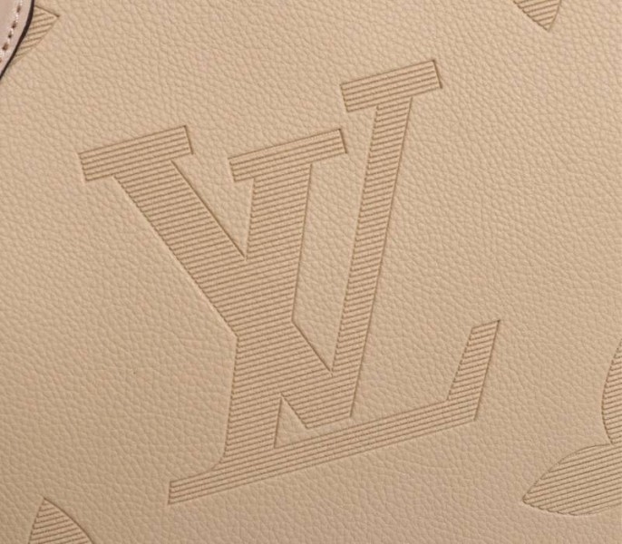 L0vis Vvtt0n Monogram Empreinte Giant Onthego MM Bag In Beige