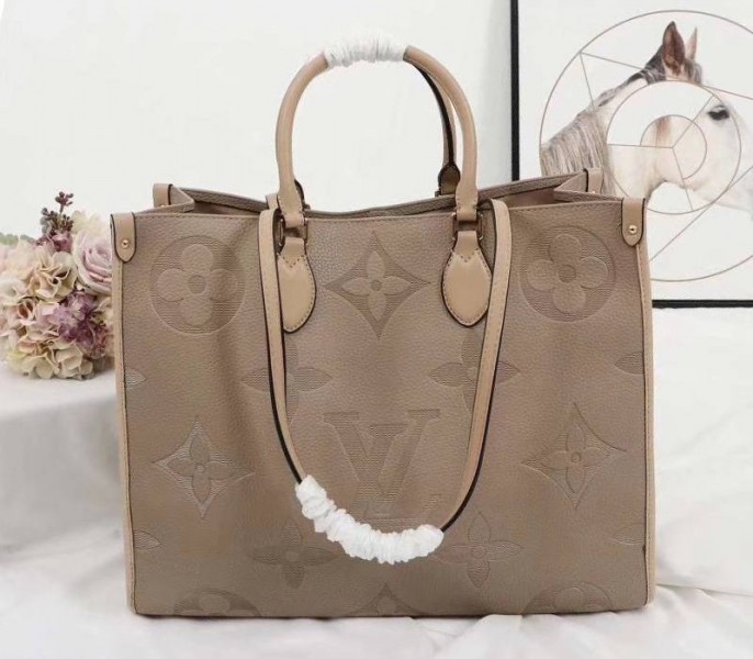 L0vis Vvtt0n Monogram Empreinte Giant Onthego GM Tote In Beige