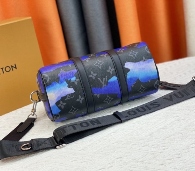 L0vis Vvtt0n Monogram Eclipse Keepall Bandouliere 25 Travel Bag In Blue And Purple Sunrise