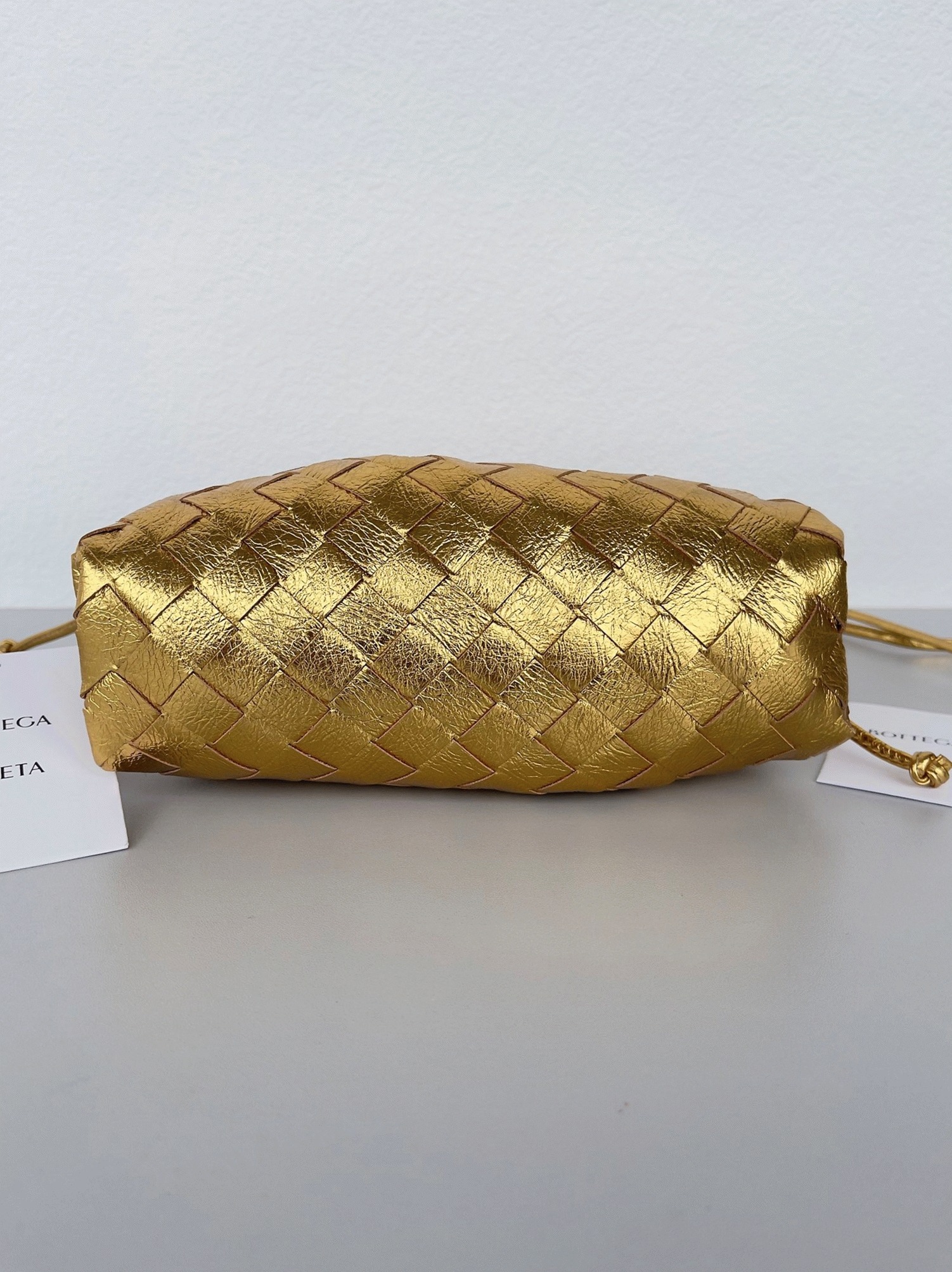 Knockoff B0tt*ga Ven*ta Mini Pouch with Strap Gold