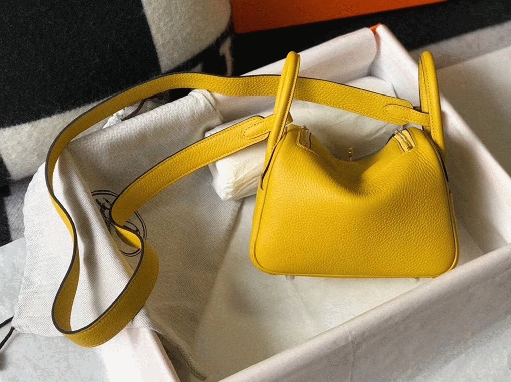 Fake luxury H**me5 Lindy Mini handbag in yellow clemence leather