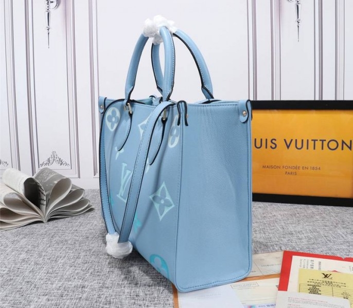 L0vis Vvtt0n Monogram Empreinte Leather Onthego MM Bag In Summer Blue